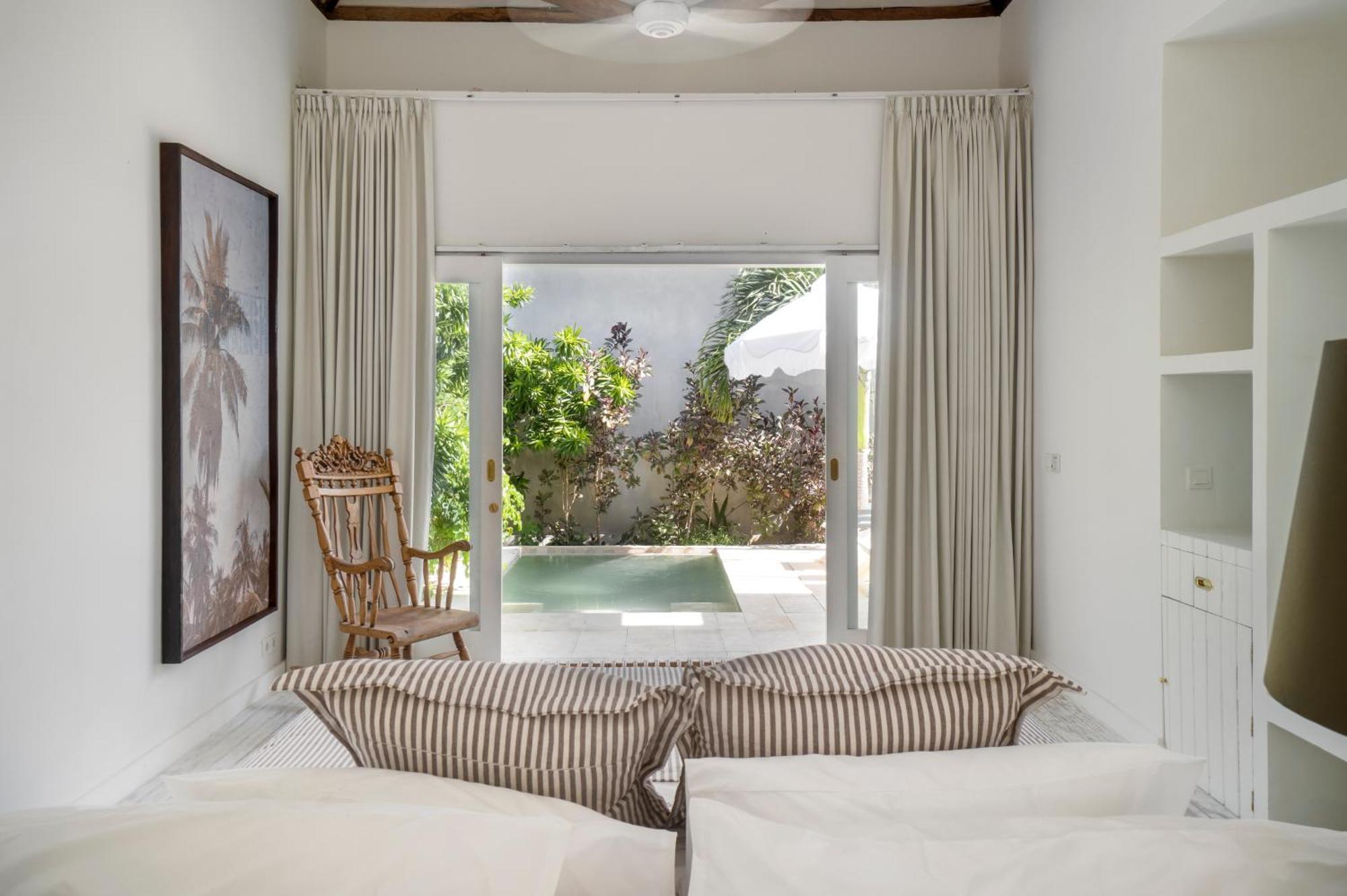 Ria Uluwatu, Tropical Chic Hotel ภายนอก รูปภาพ